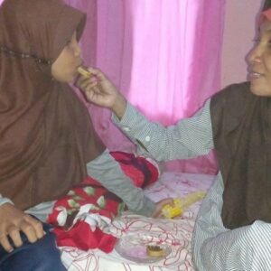 Help Mrs. Indri, a single mother with a brain infection